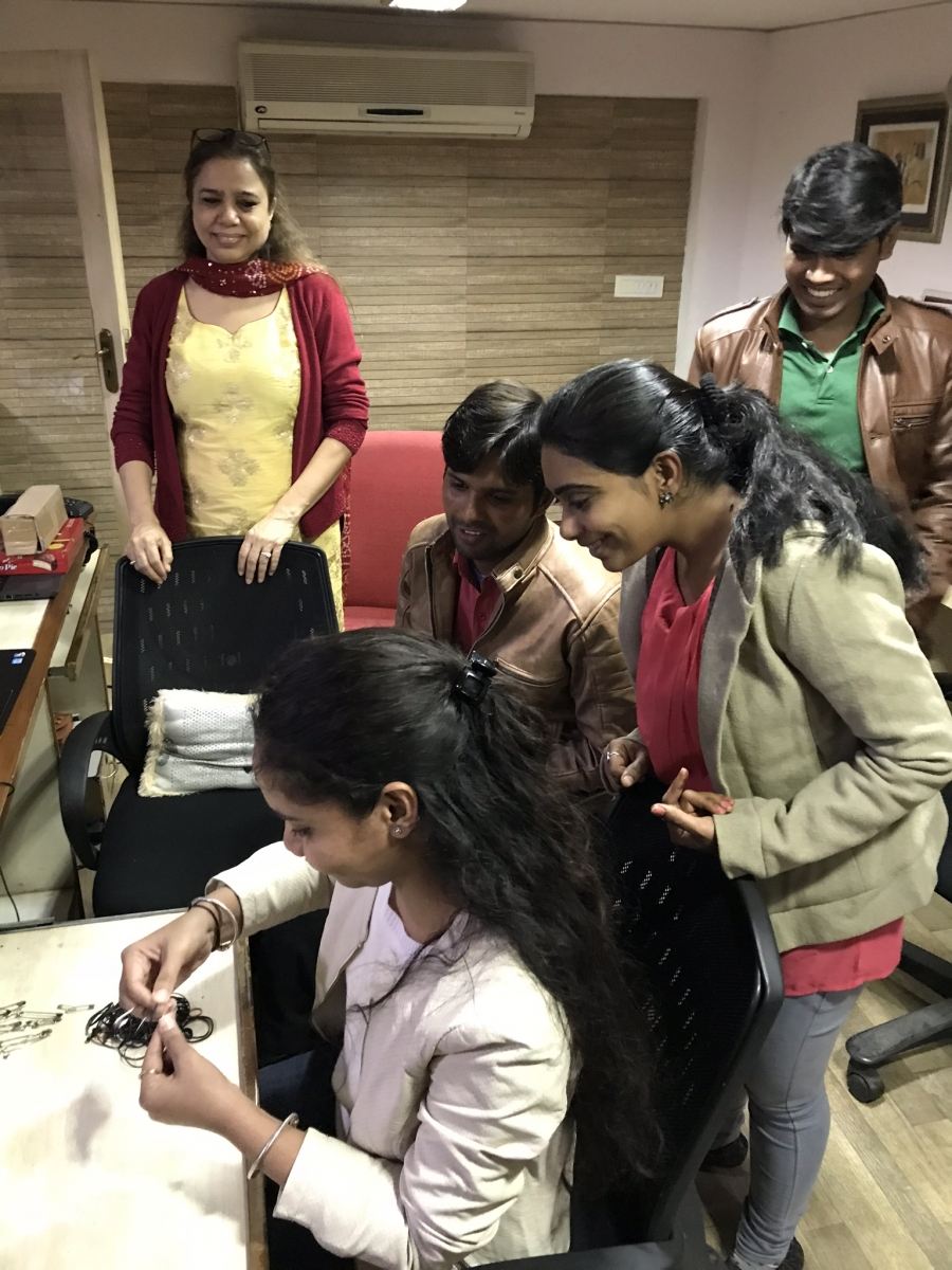 Diksha working on the Pin and Rubber Challenge